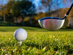 golf ball and club